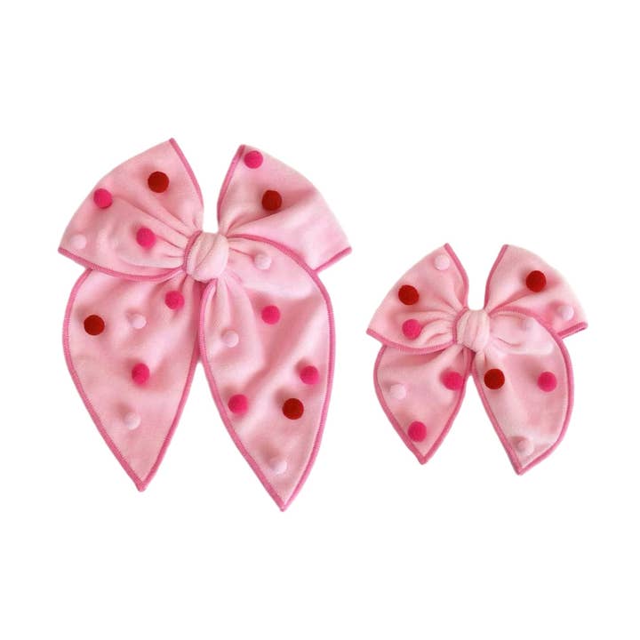 Lazo de terciopelo rosa claro con pompones y borde remallado con clip para venta al por mayor de Pretty in Pink Bows
