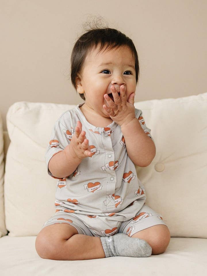 Little Joy Co. - Wholesale Jumpsuit - Baby - Mama Tattoo Hearts Bamboo Henley Romper