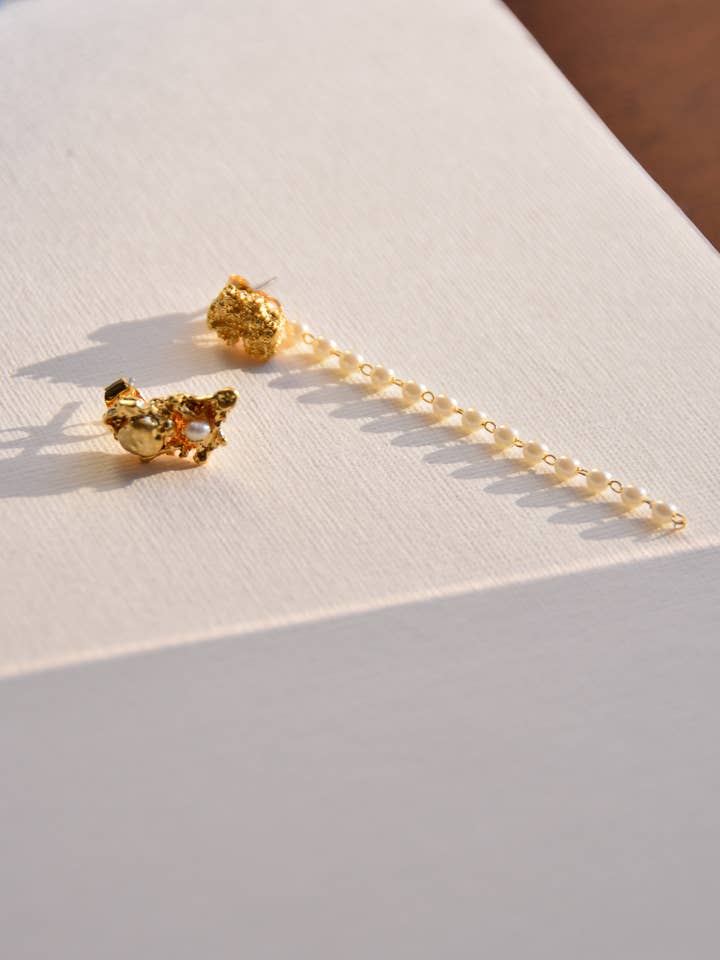 Aretes colgantes de oro fundido con perla para venta al por mayor de Marco Visconti