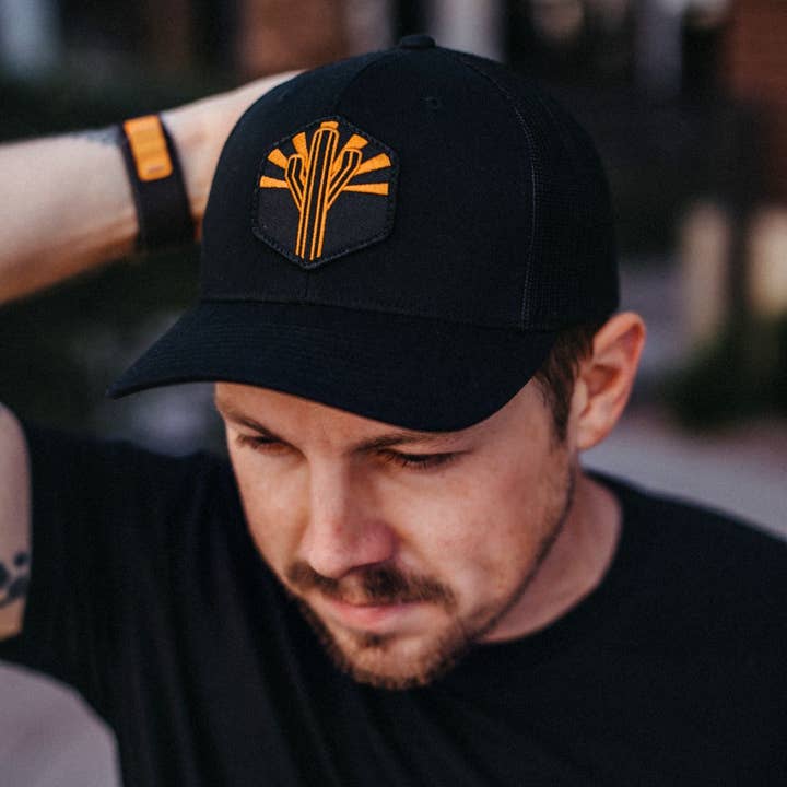 Copper Sentinel Curved Trucker - Black for wholesale by Iconic Arizona