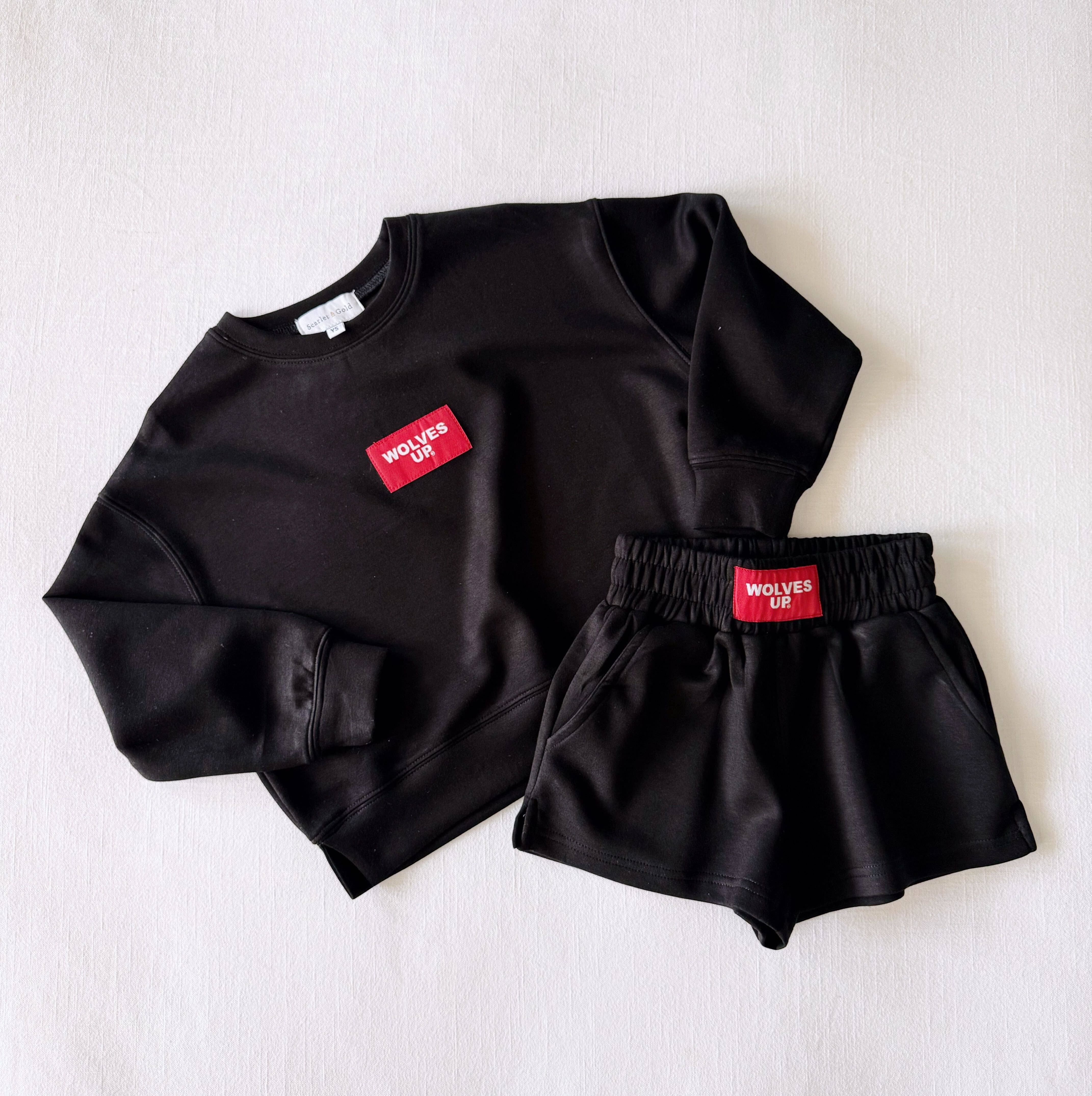 Black The Ava Airy Crewneck Black| Wolves Up Woven Label for wholesale on Faire1