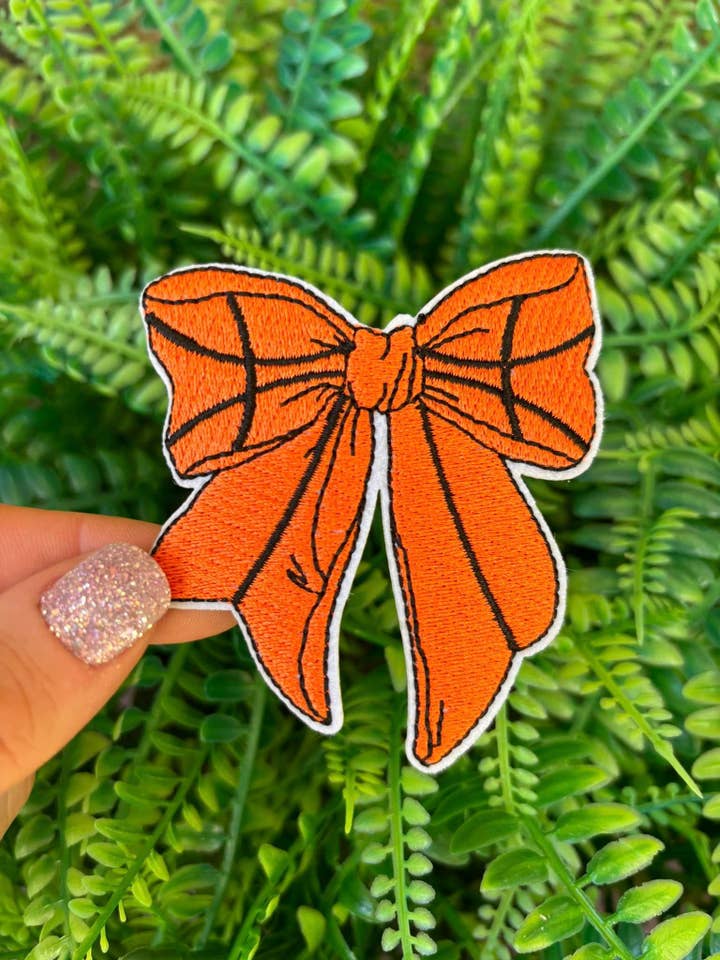 Orange rosett julmärken. för wholesale av Icon Punch