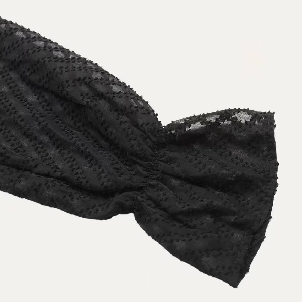 Noir Combinaison Grace noire transparente à col en V et manches longues et jambes larges en vente sur Faire4