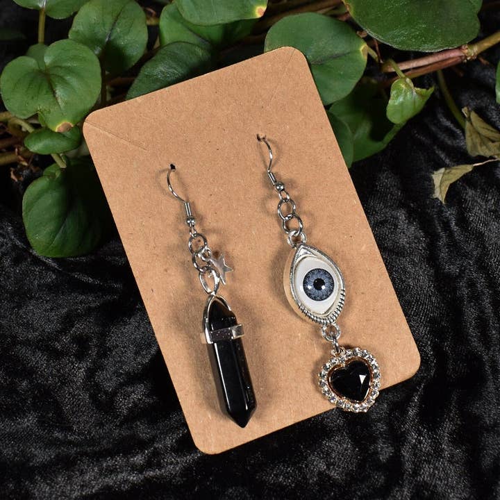 Mismatched Eye And Crystals Earrings for wholesale by Naughty Pawsies