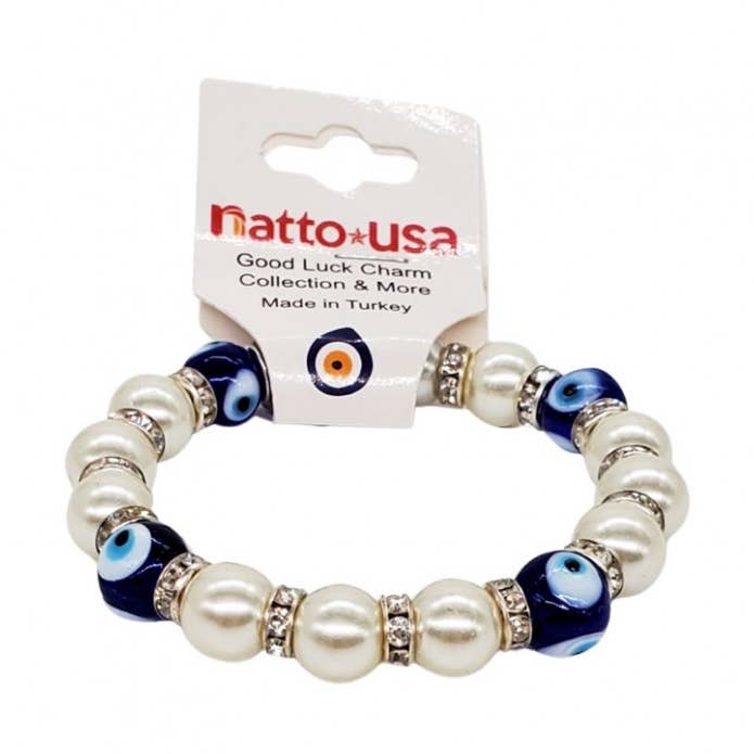 Bracciali Lucky Eye Pearl bianchi per la vendita all'ingrosso da parte di Natto USA