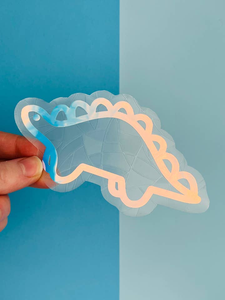 Dinky the Stegosaurus Suncatcher for wholesale by Poppodopolis