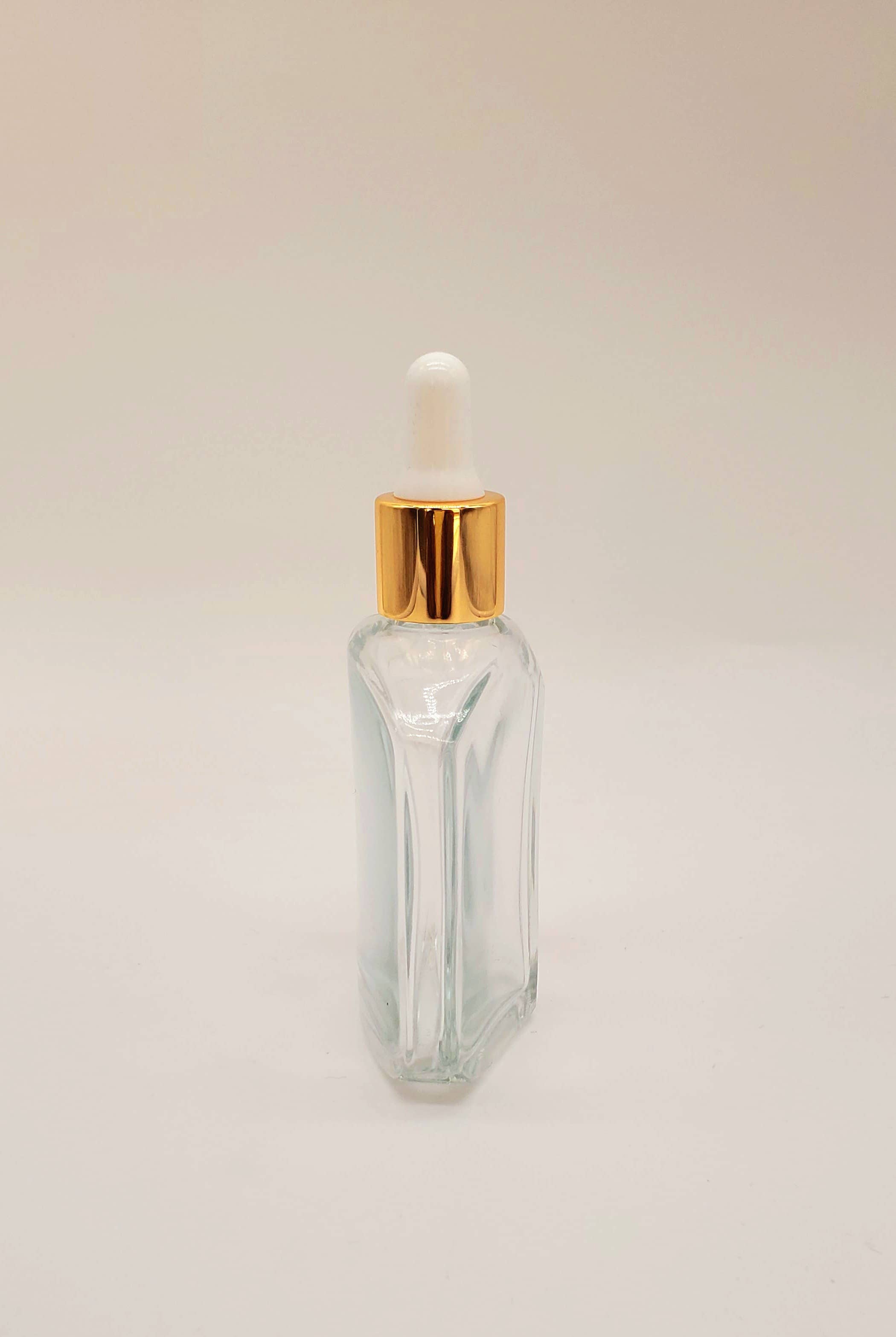 Ameelah Essentials - Wholesale Essential Oil Holder - (10) 2 oz Clear Glass Bottle w/ Shiny Gold Band & White Tip1