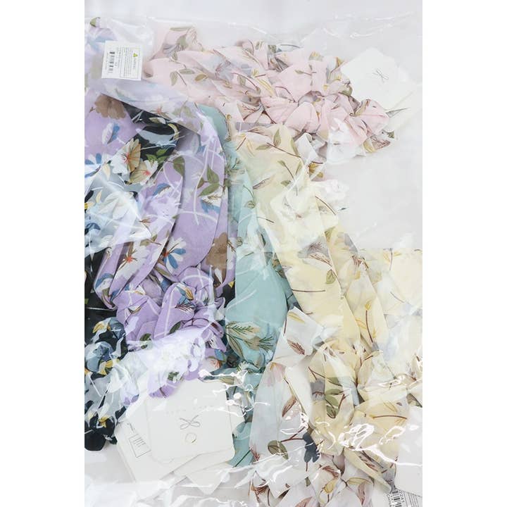 MÉLANGER LA COULEUR Chouchou fleuri en queue de cheval à longue queue en vente sur Faire5