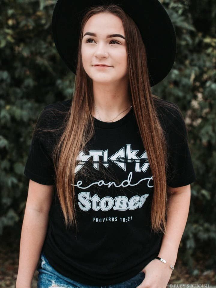 Sticks & Stones | Scripture T-Shirt | Ruby’s Rubbish® for wholesale by Ruby’s Rubbish