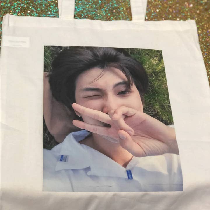 Kim Namjoon Cute Boyfriend Grass Inspired Pic Tote bag for wholesale by Stuckonkpop