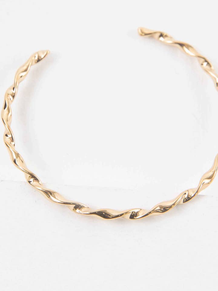 Gold Twisted Cuff for wholesale by Lovoda