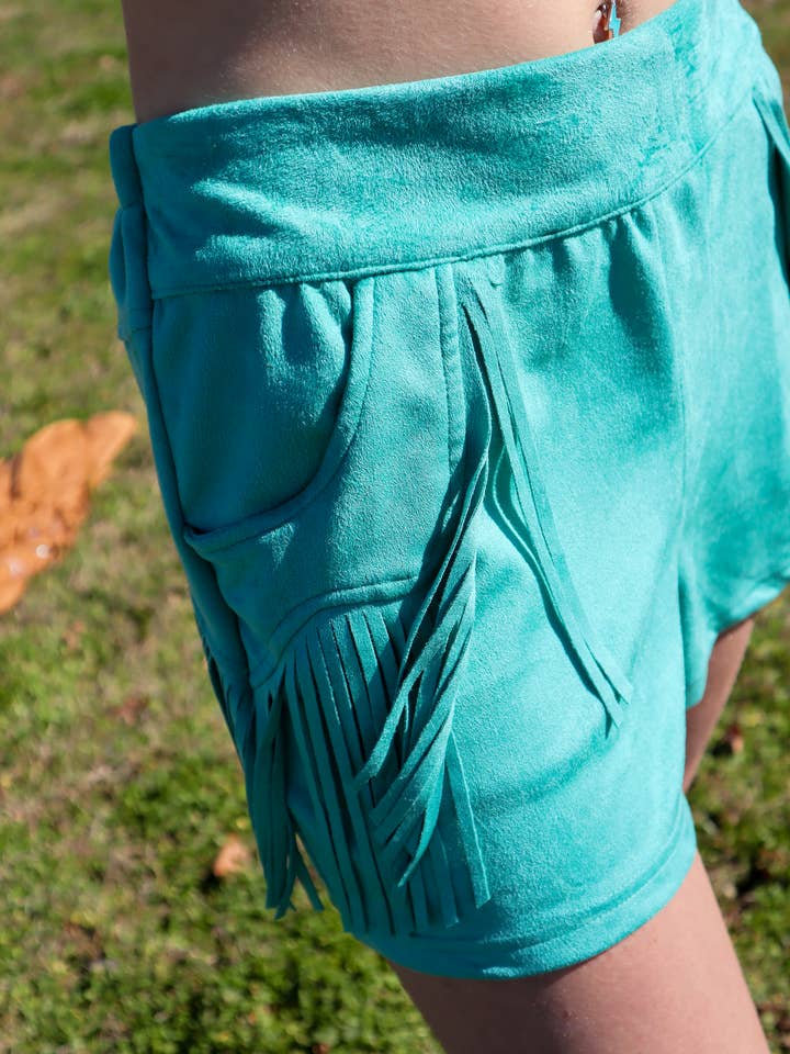 MK265 Holy Moly Vegan Suede Fringe Shorts - Turquoise for wholesale by Merigold Kiss