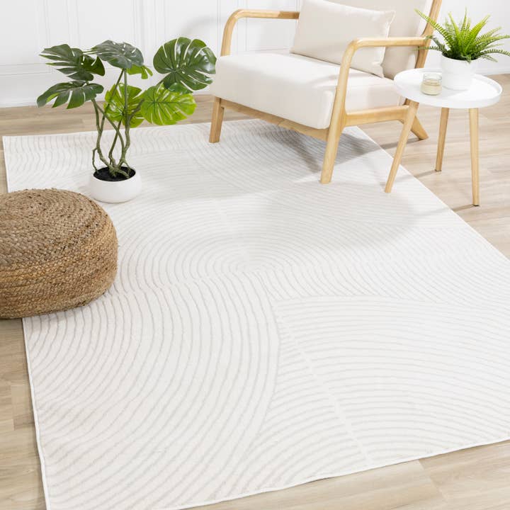 Hayden Soft Subtle Curves Cream Polyester Area Rug for wholesale by Kalora
