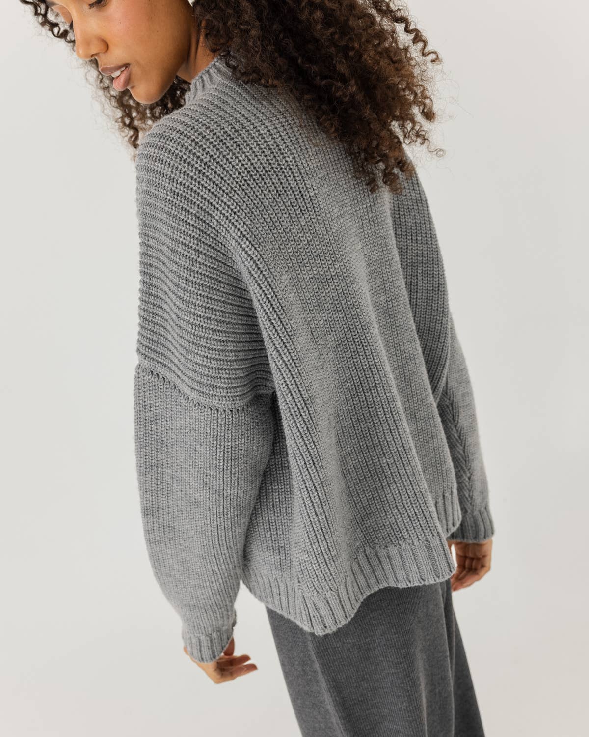 Laumės Sweater: Fog Gray 100% Merino Wool Sweater for wholesale on Faire2