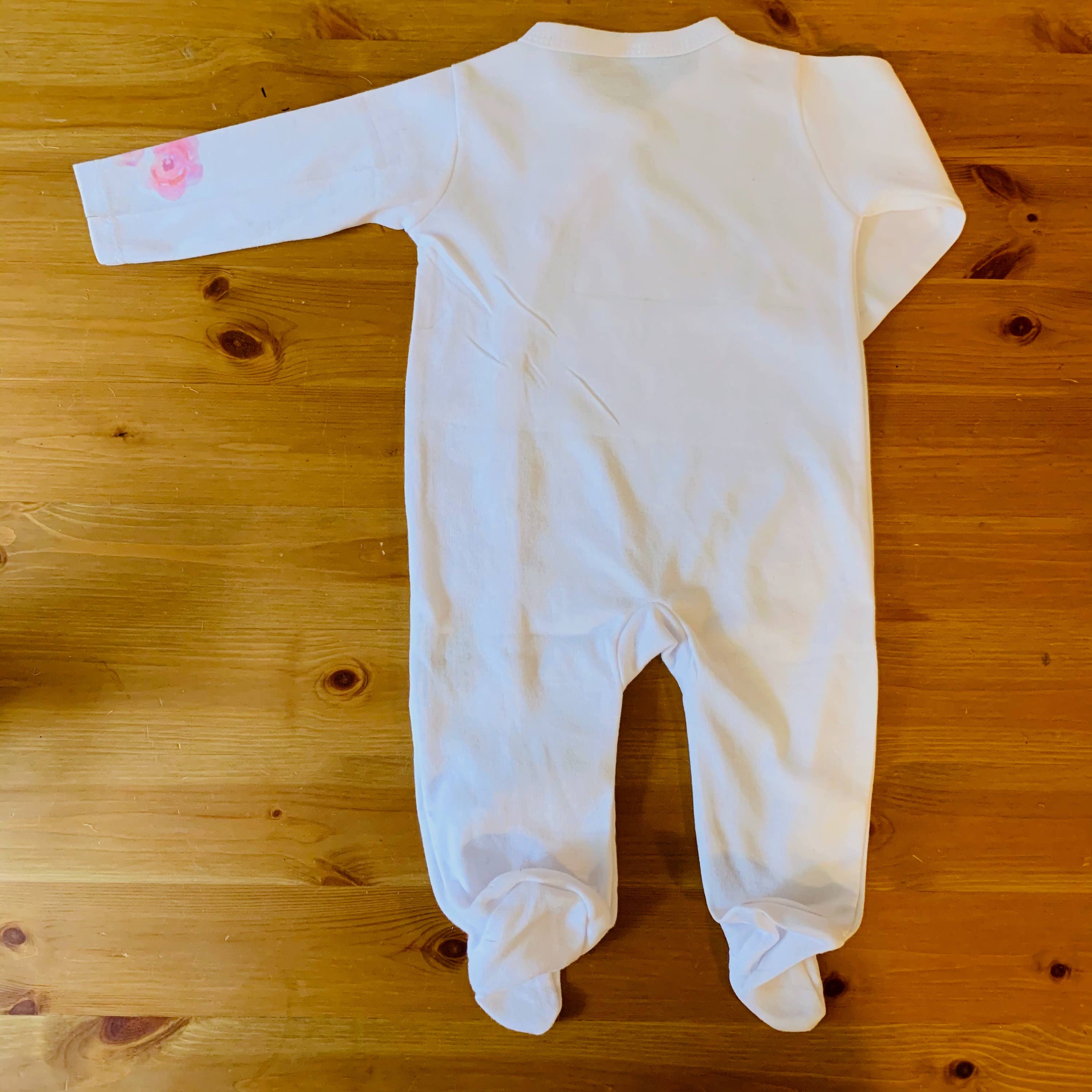 Cloud White Baby Footed Romper - Watercolor Flowers for wholesale on Faire5