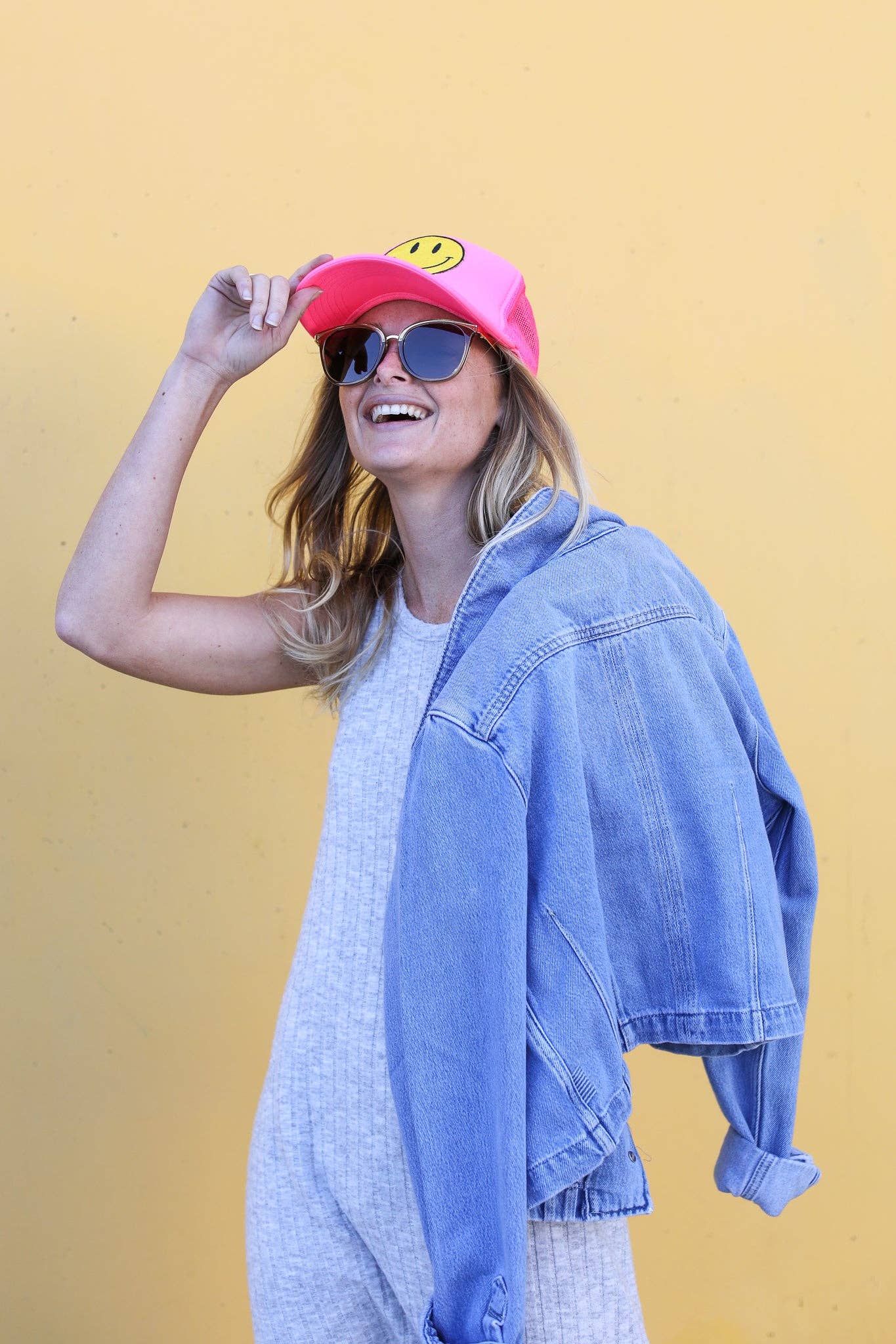 Happy Face Trucker Hat in Pink for wholesale on Faire4