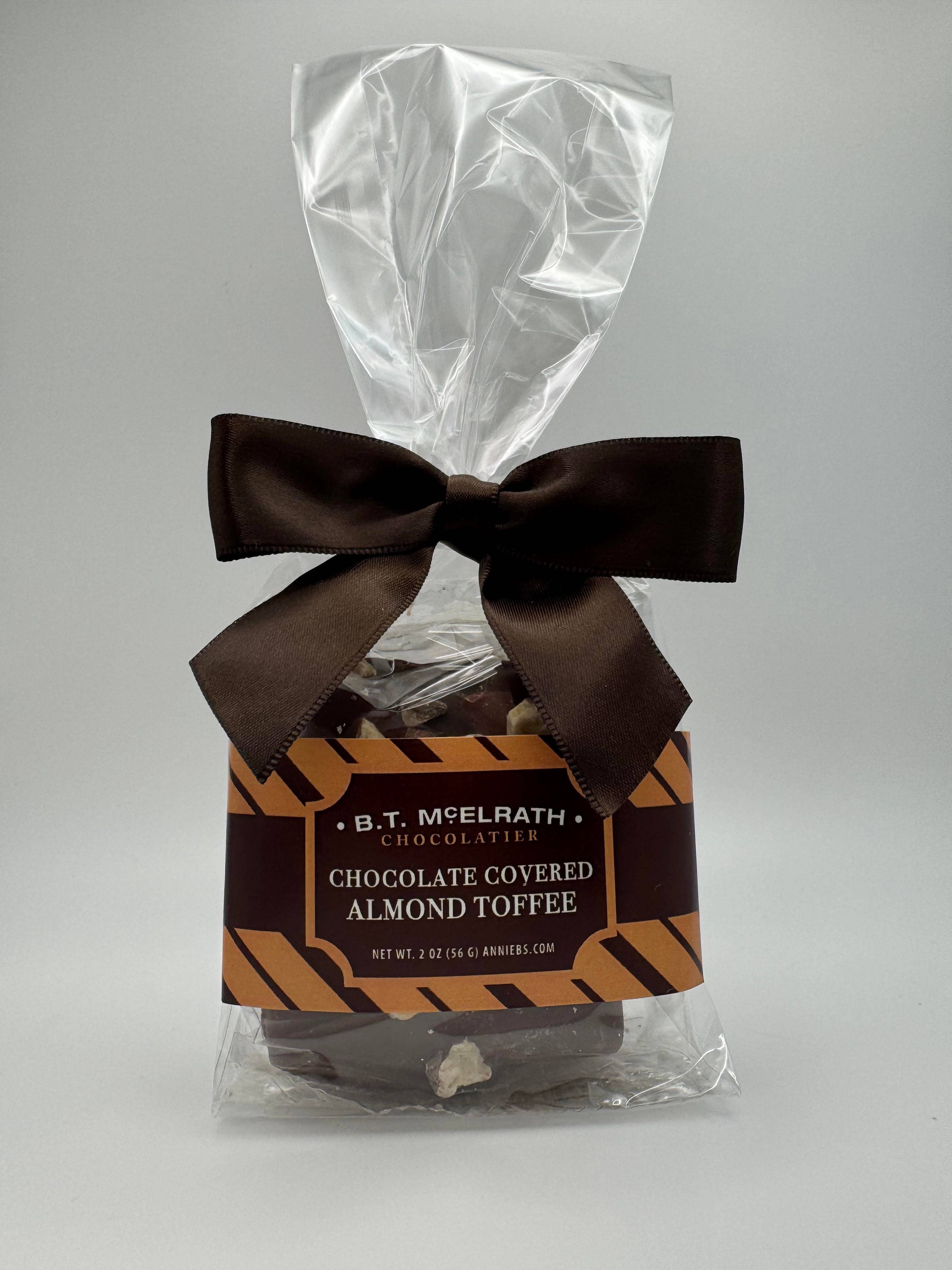 Annie B's - Vente Friandises enrobées de chocolat - 2 pièces de caramel - Sac avec nœud
