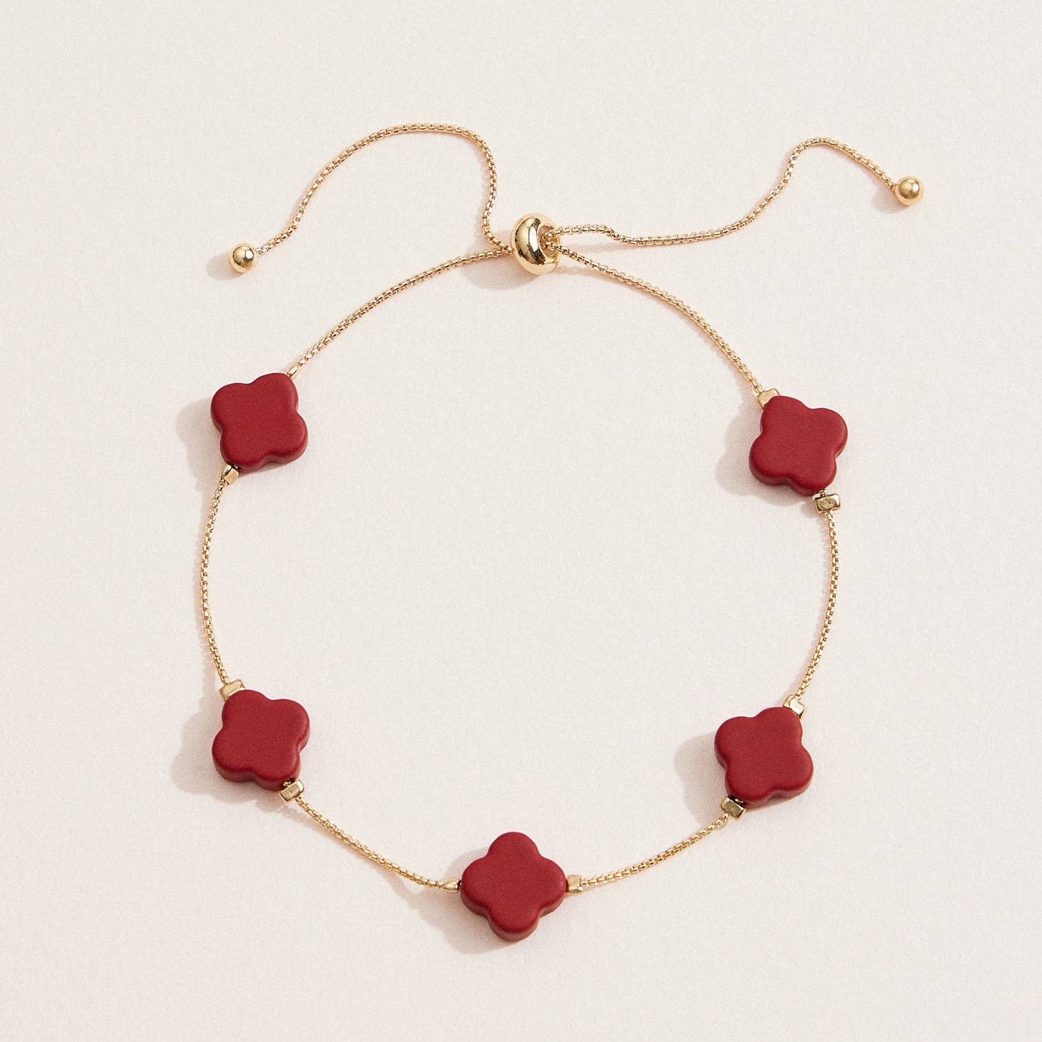 Lilla Haven - Wholesale Charm/Dangle Bracelet - Adjustable Four-Leaf Clover Charm Bracelet – Delicate Chain with Vibrant Clover Accents in Red, White, Black, or Pink1