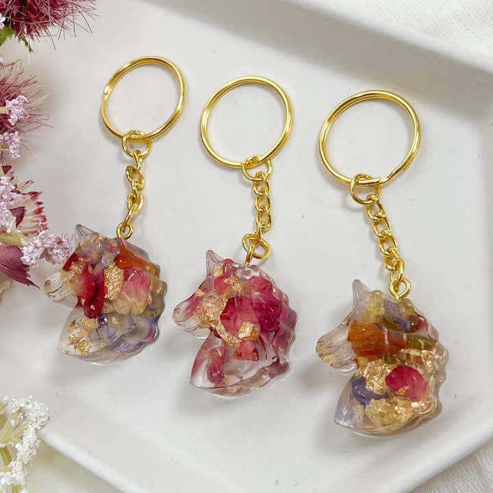 Unicorn blomma kronblad nyckelring för wholesale av Rooted