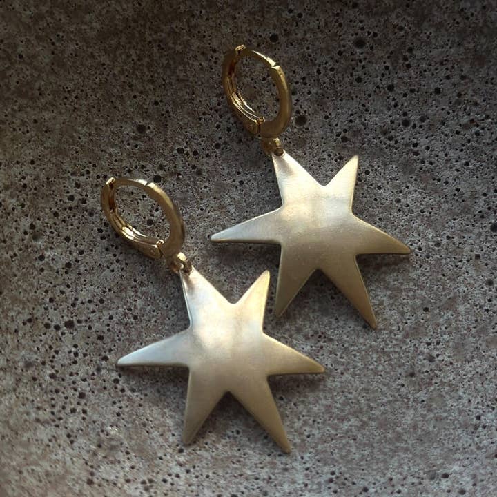 Whimsical Star Dainty Celestial Huggie Hoop Earrings for wholesale by The Brass Era