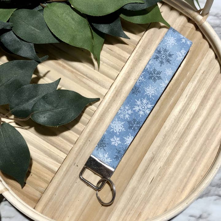 Blå Glitter Snowflake Print Fabric Wristlet nøglering, nøglering for engroshandel hos MDStickerShop