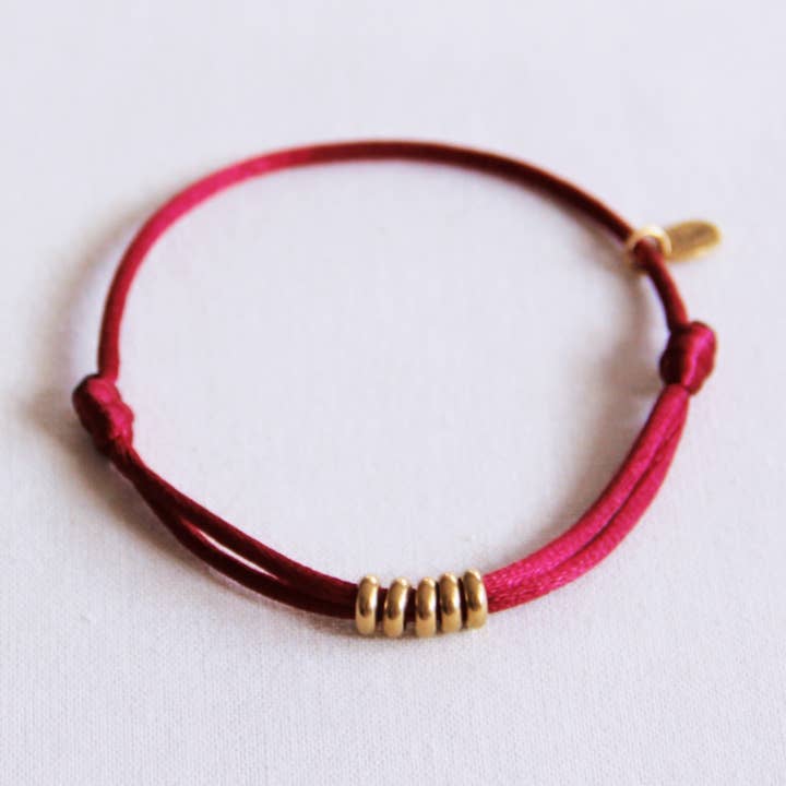 Satin bracelet with rings – burgundy/gold for wholesale by Bazou