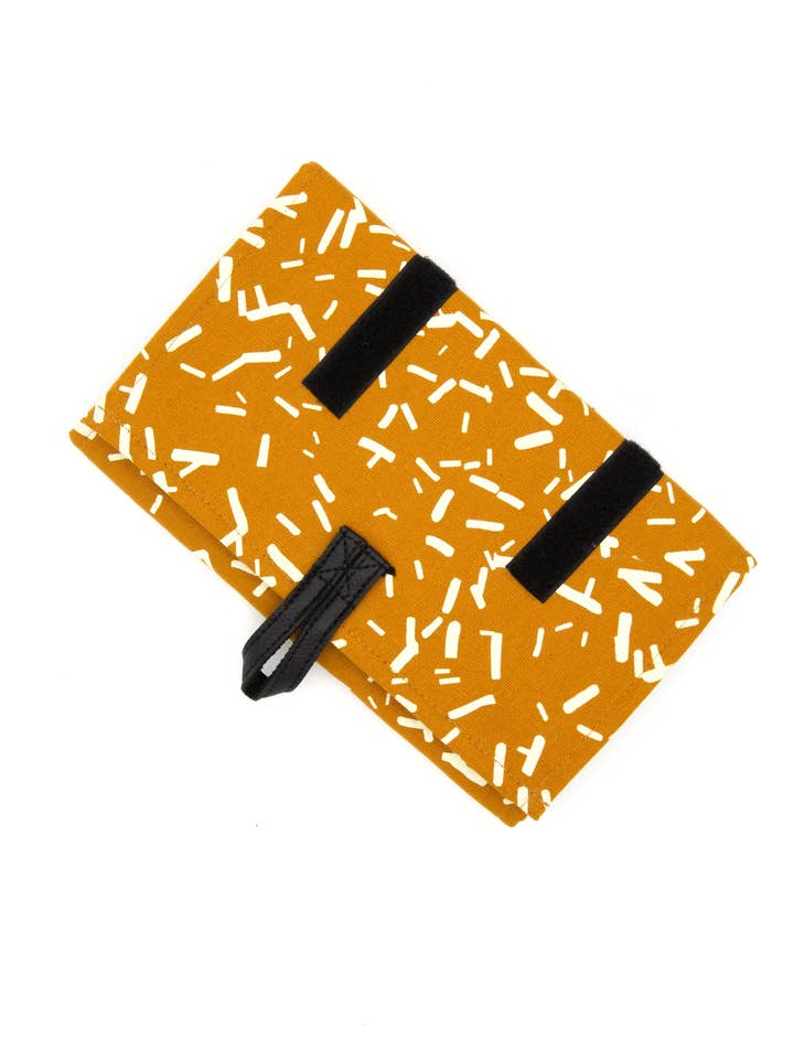 Wayfarer Jewelry Roll Travel Case - Confetti Mustard for wholesale by Fair Anita