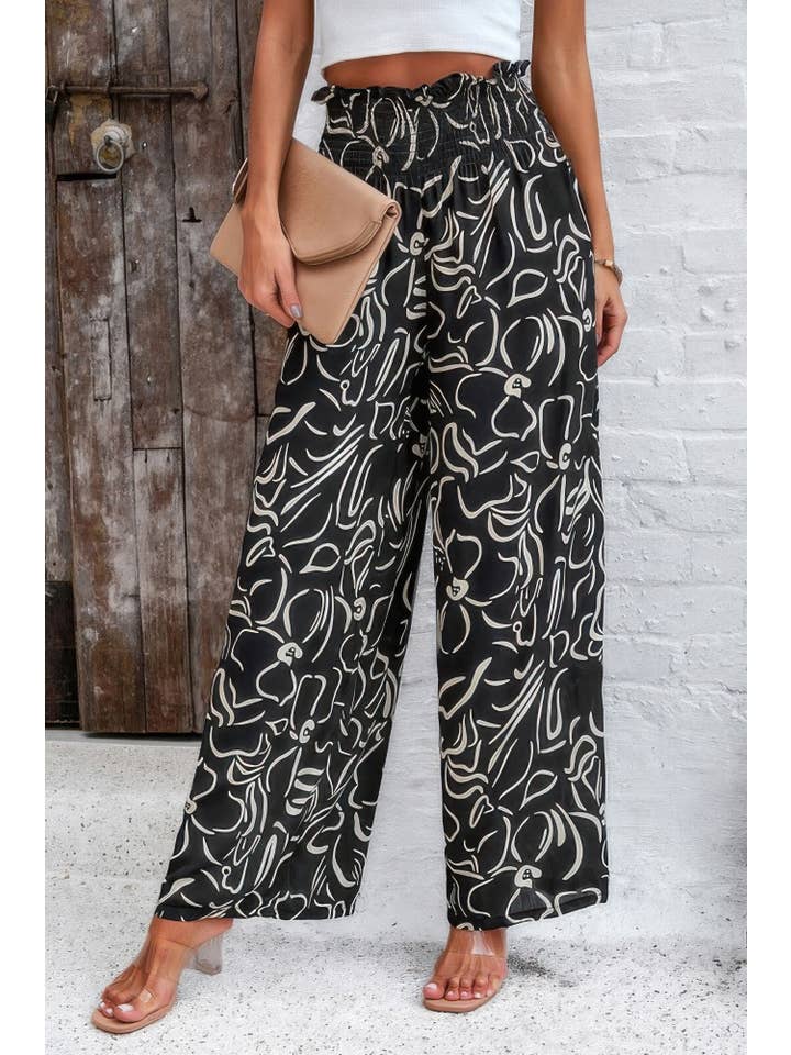 CC Wholesale Clothing - Venta al por mayor Pantalones - Mujer - Pantalón de Pierna Ancha de Cintura Alta con Volante Doblado y Estampado Integral1