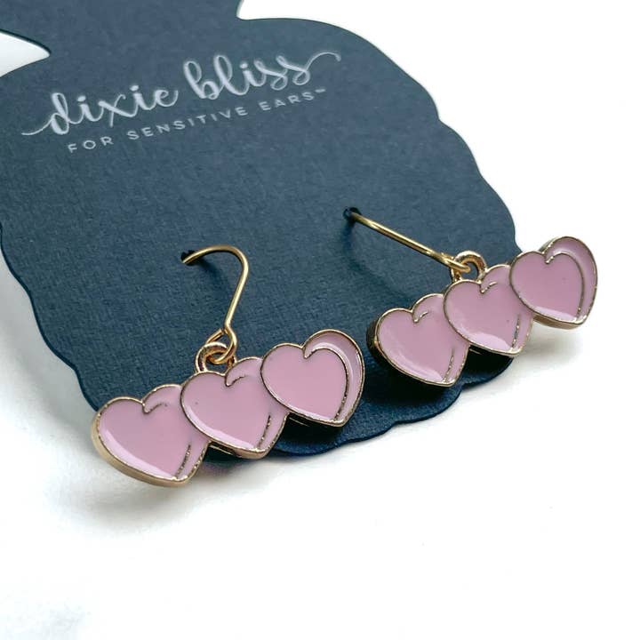Meeting of The Hearts Baby Pink Enamel Dangle Earrings for wholesale by Dixie Bliss