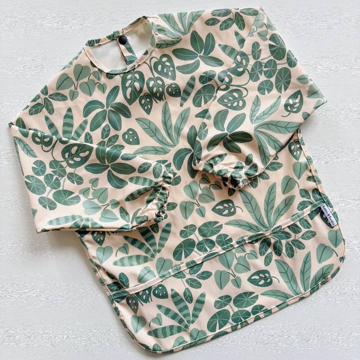Houseplant Haven Long-Sleeved Waterproof Bib (M & L) for wholesale by Bobbin and Bumble - Baby Changing Mats