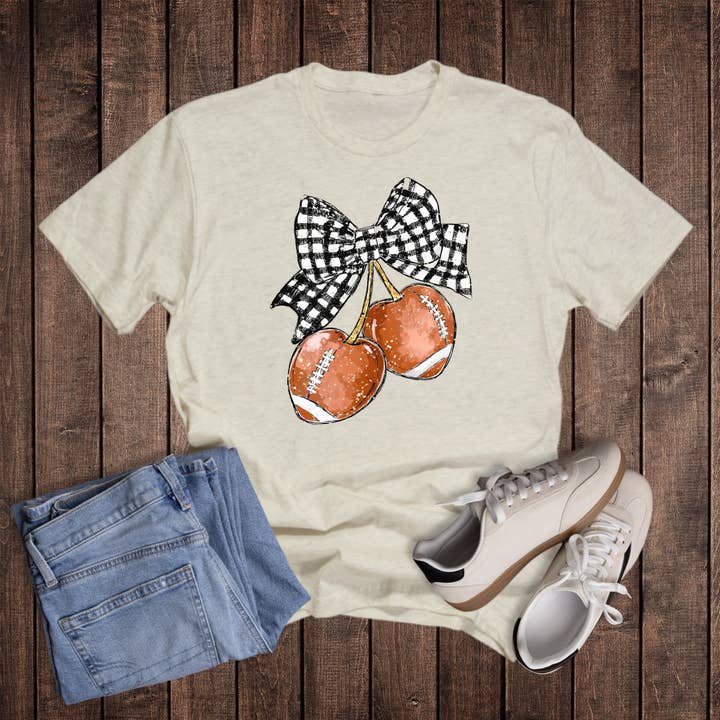 Fußball Kirschen Check Bow Grafik T-Shirt für den Großhandel von Dust and Roots