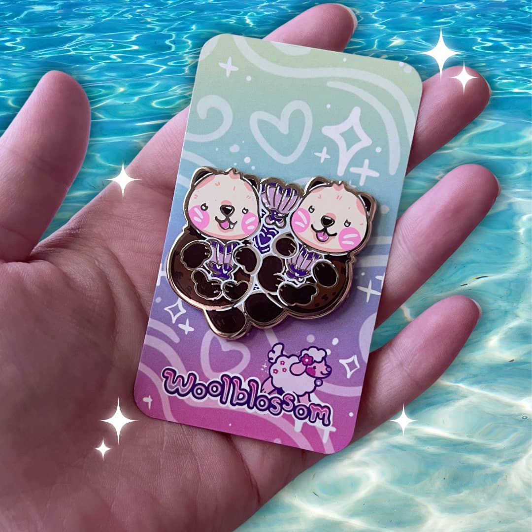 Floating Otter Couple ~ Enamel Pin for wholesale by Woolblossom