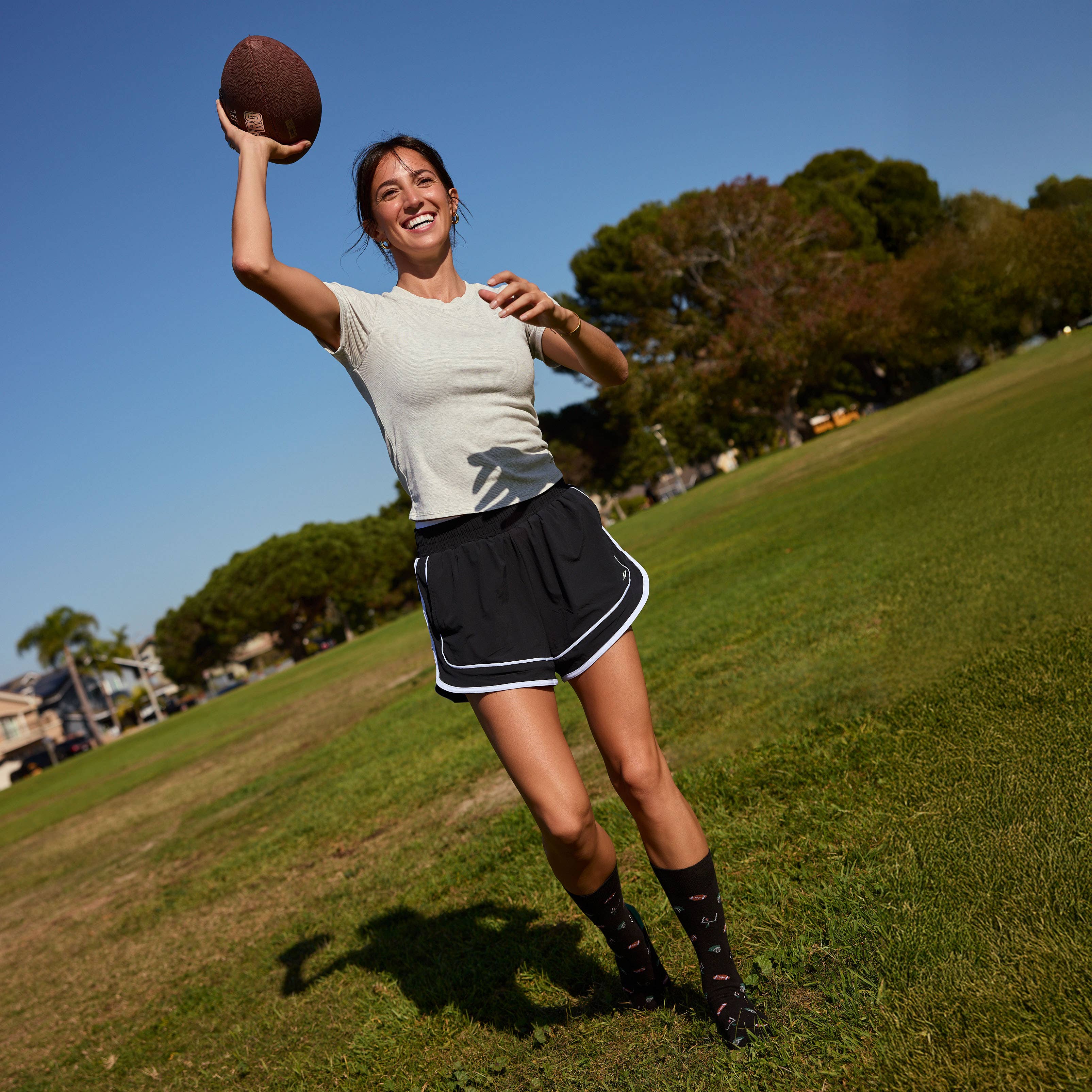 Conscious Step - Wholesale Socks - Unisex - Socks that Support Youth Sports (Black Footballs)6