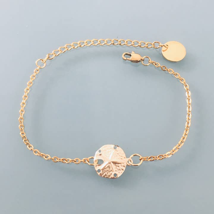 Bracelet femme gourmette dollar des sables plaqué or 24 k pour la vente par Clovers
