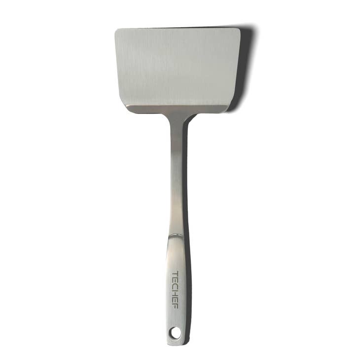 TECHEF - ChefCore 304 Stainless Steel Solid Turner Spatula with Ergonomic Handle, One-Piece Unibody Design, Rustproof & Heat Resistant, 10.5" Serving Utensil for wholesale by TECHEF