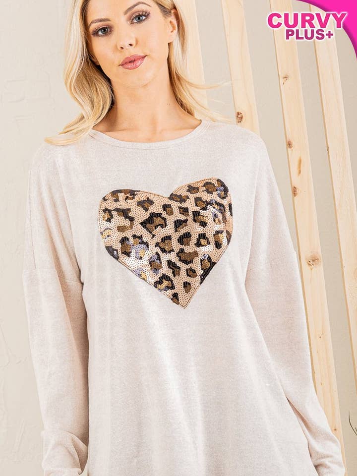 ROUND NECK SOLID TOP WITH ANIMAL SEQUINS HEART PATCH DETAIL PLUS SIZE for wholesale by Stylish Wholesale