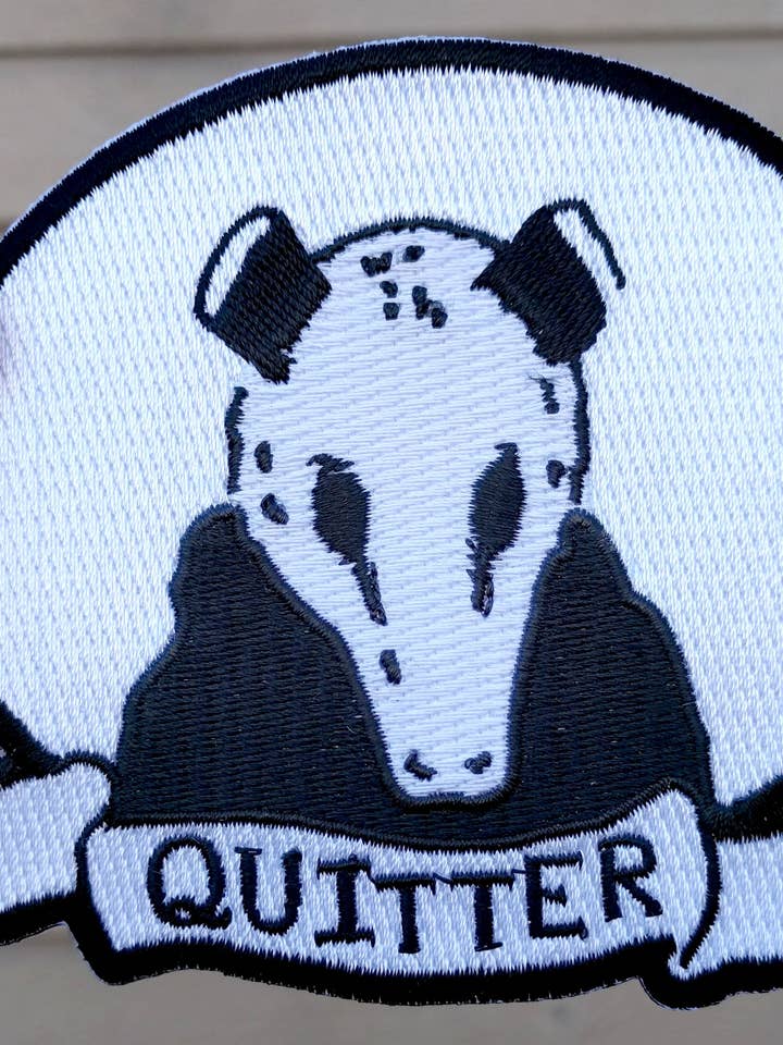 Toppa ricamata: Clementine - Quitter per la vendita all'ingrosso da parte di Silver Sprocket