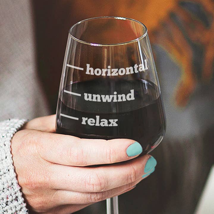 Relax, Unwind, Horizontal' Wine Glass for wholesale by Becky Broome