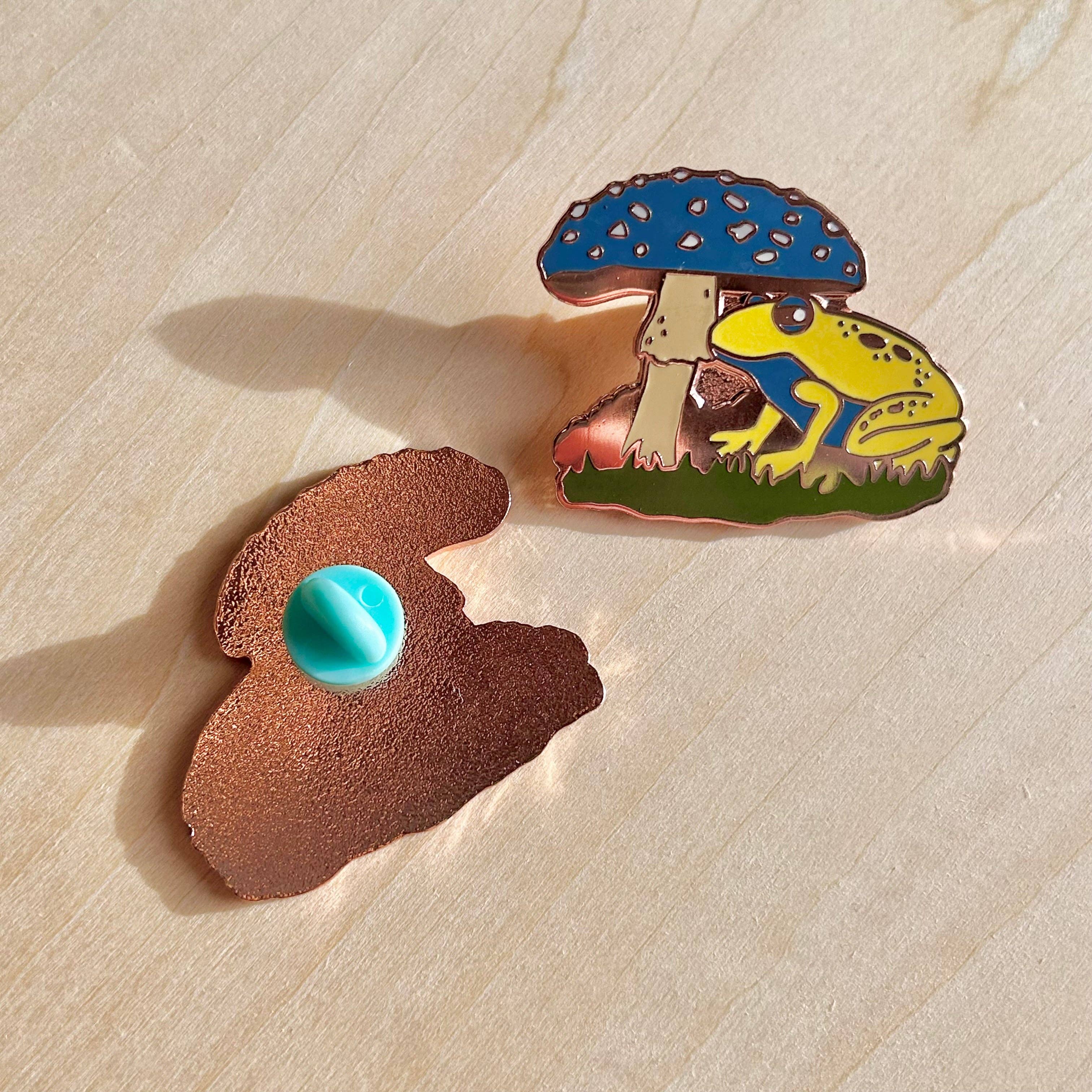 Write Your Story – wholesale Lapel pin/button – Yellow Fungi & Frog Enamel Pin1