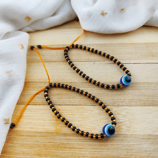 Adjustable Evil Eye Gold Black Beads Nazaria Bracelet For Kids and New Borns for wholesale by The Colourful Aura
