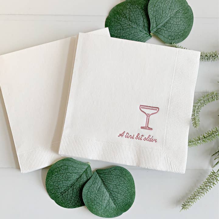 EnFete, LLC - Wholesale Disposable Napkin - Tini Bit Older Cocktail Napkins - Pink on White