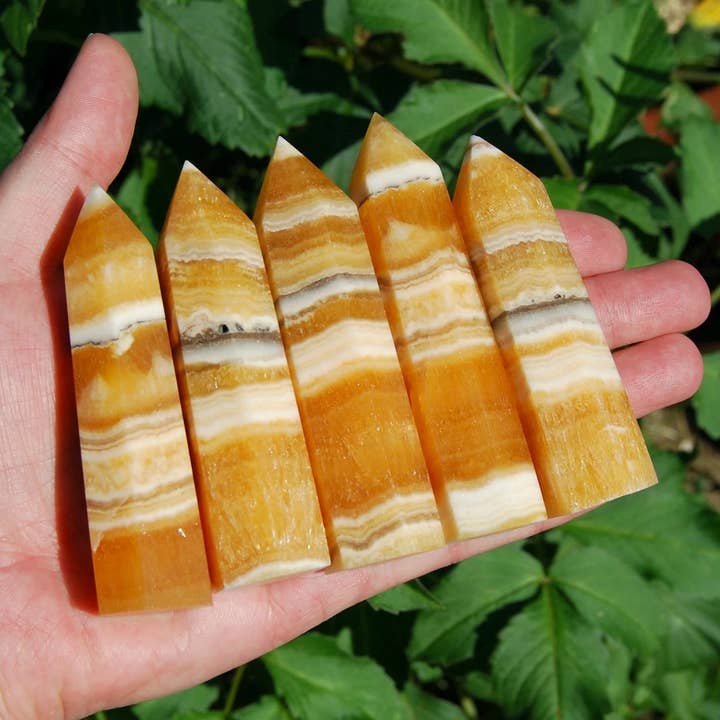ONE Banded Orange Calcite Crystal Tower for wholesale by Caspar Curiosities