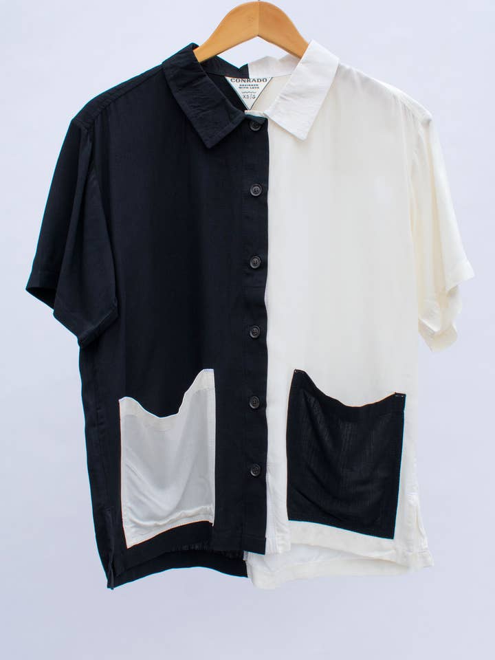 Nicole To-tone Top - Sort & Hvid for engroshandel hos CONRADO®