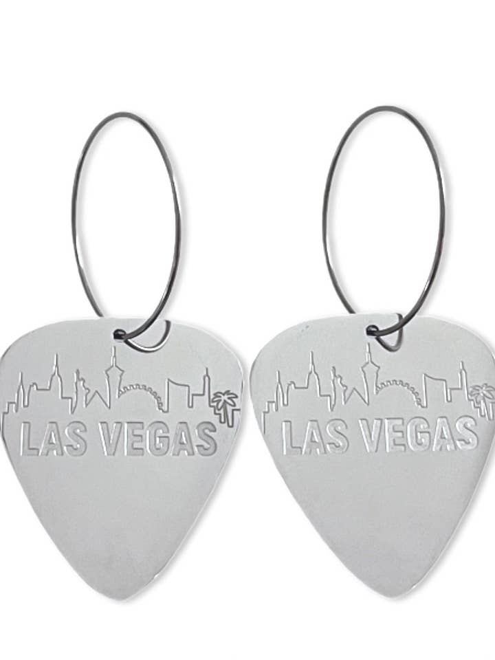 Boucles d'oreilles réversibles en acier avec médiator Skyline de Las Vegas pour la vente par Groupie Love