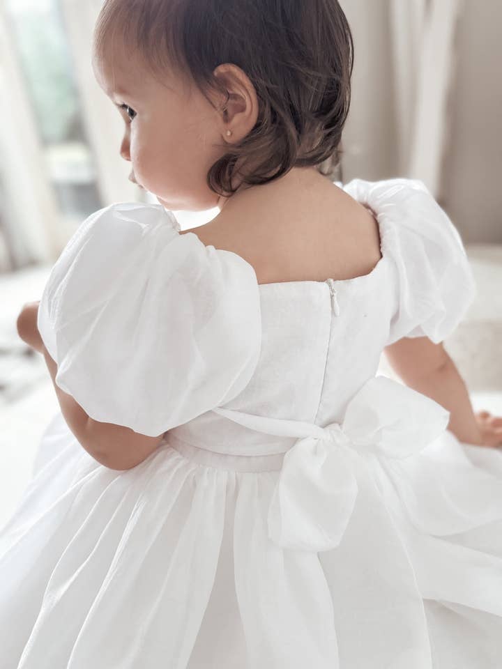 Lucy Puff Sleeve White Baby Dress for wholesale by A Little Lacey