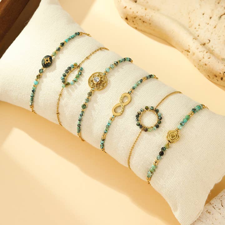 Set of 6 Gold Bracelets with Emerald Green Beads for wholesale by JOYA