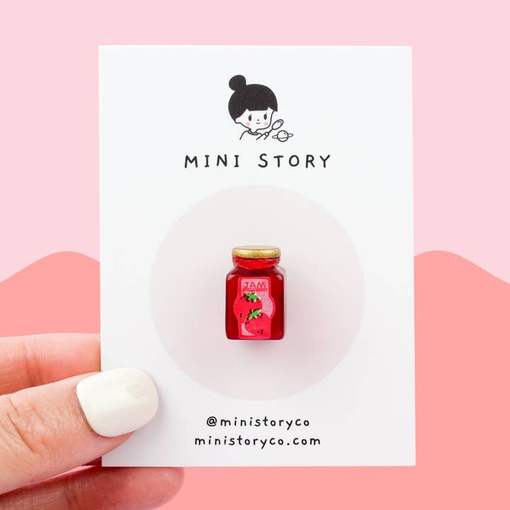 Strawberry Jam Jar Pin | Fruit Jam Bottle Brooch | Miniature Jam | Cute Foodie Accessory | Berry Lover's Gift | Quirky Food-Themed Pin for wholesale by Mini Story Co