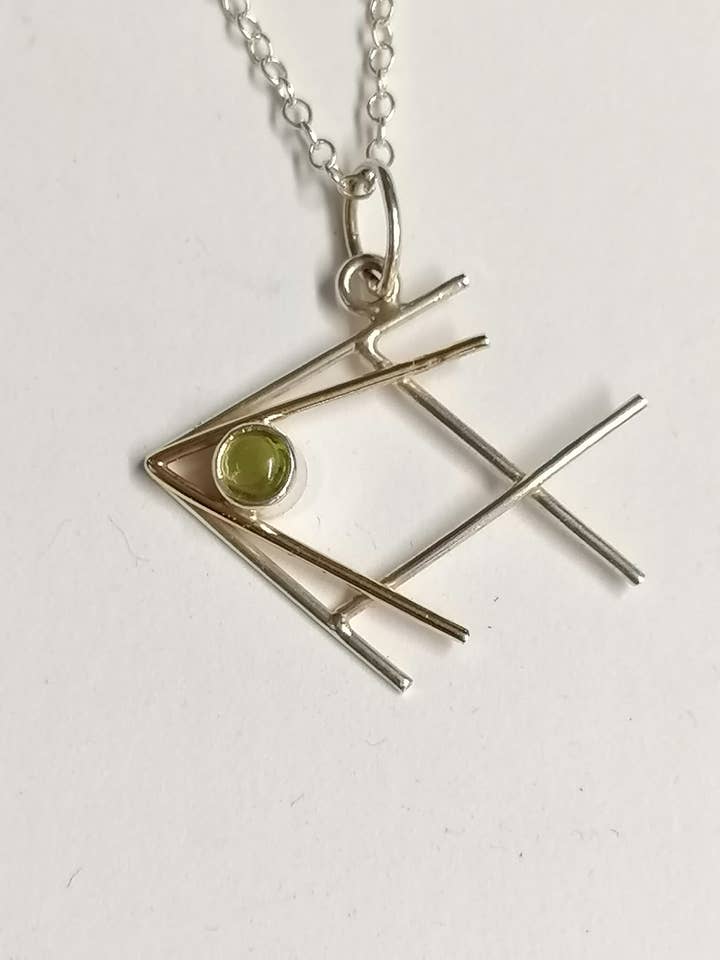 Fish Pendant Hand Made From Silver and 9ct Gold for wholesale by Andrew O'Dell Jewellery