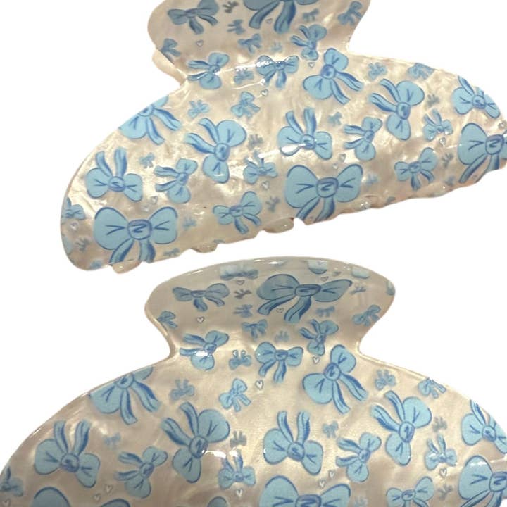 Beautiful blue bow hair clip for wholesale by lil darlings inc