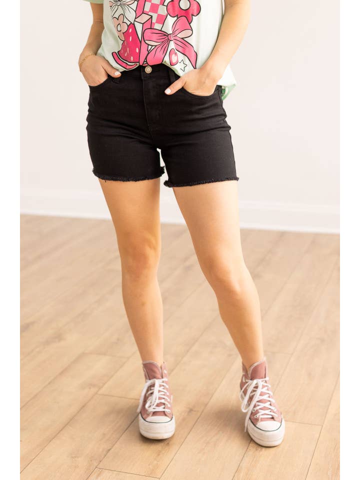 The Lola Black Distress Denim Shorts for wholesale on Faire